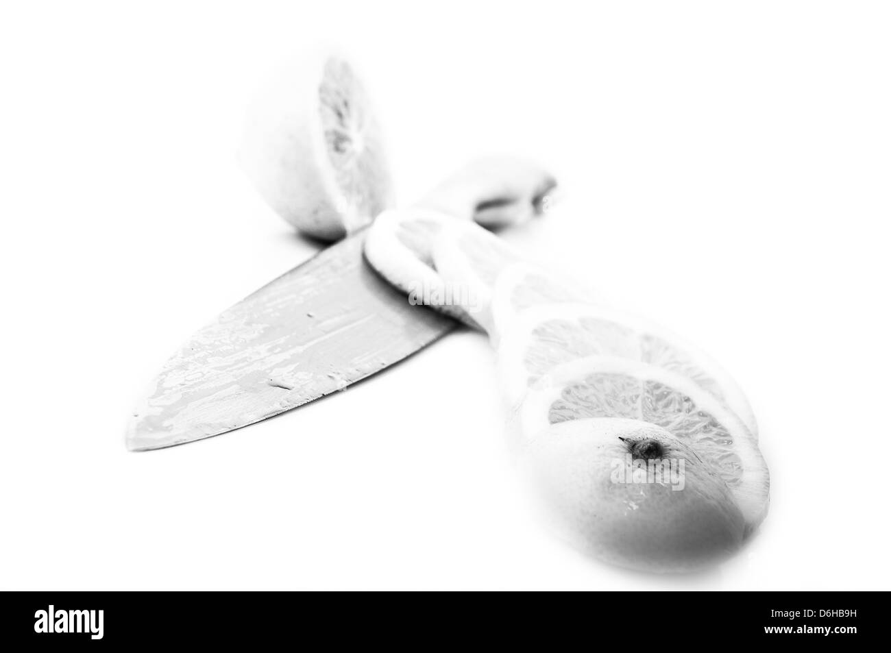 In bianco e nero di limoni su uno sfondo bianco Foto Stock