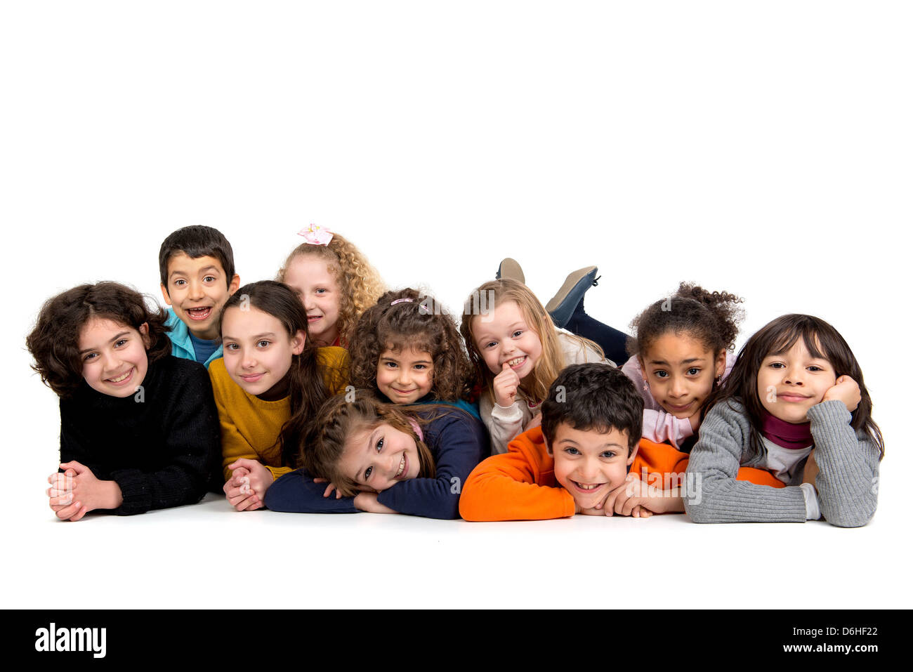 Gruppo di bambini in posa isolato in bianco Foto Stock