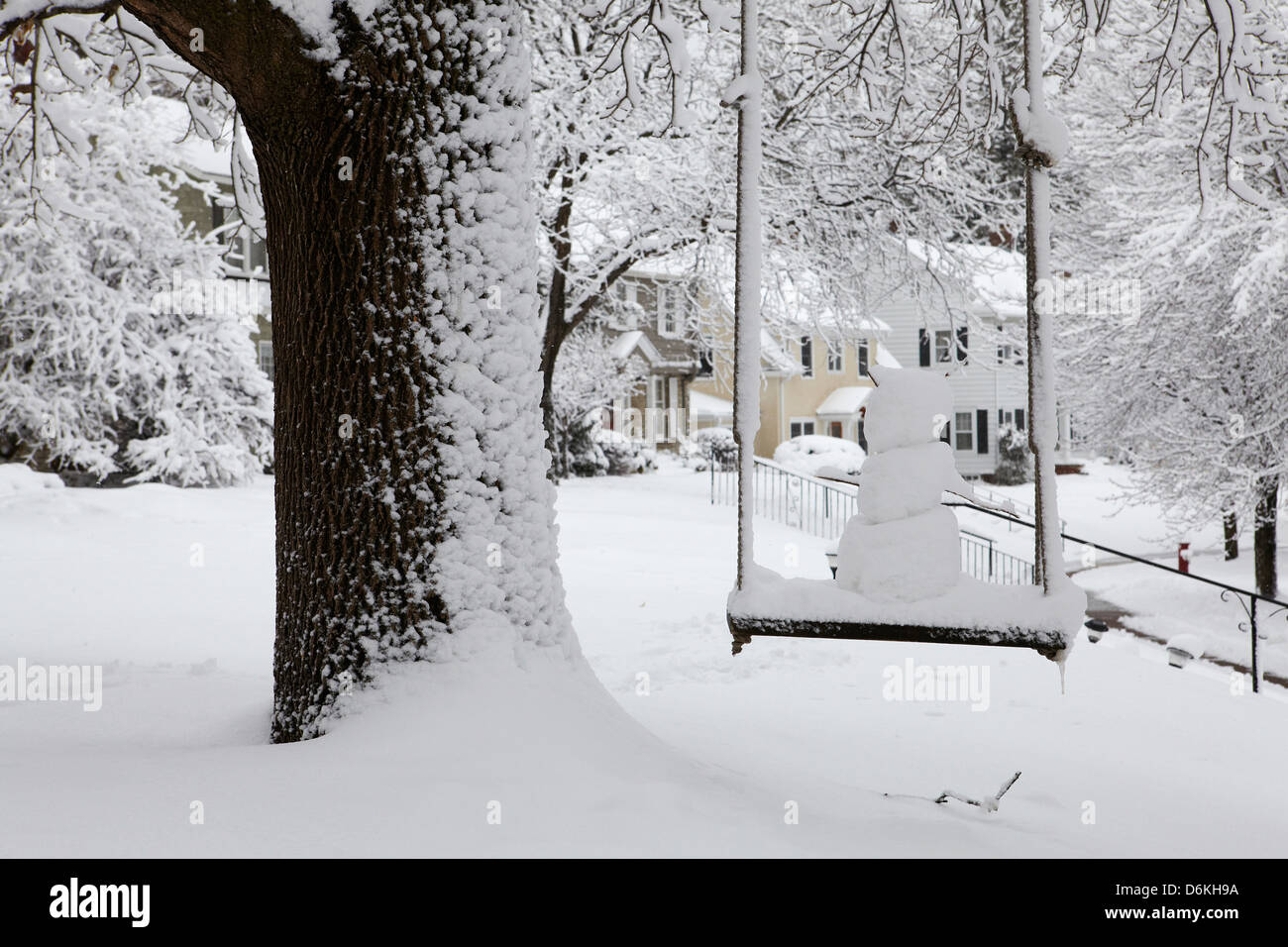 Pupazzo di neve su swing Foto Stock