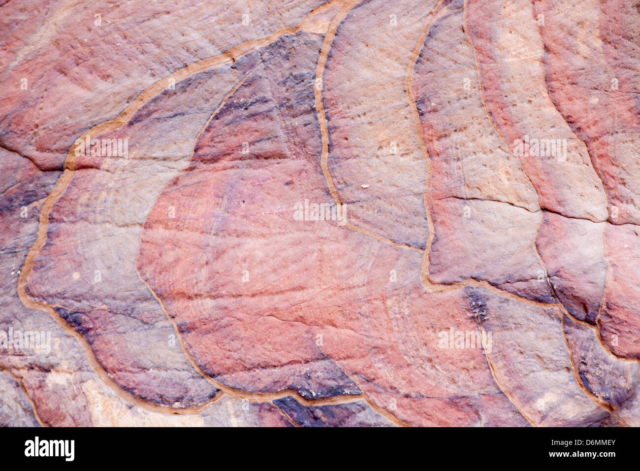 Astrazione naturale in pietra, da Petra, Giordania, una rosa texture di sfondo Foto Stock