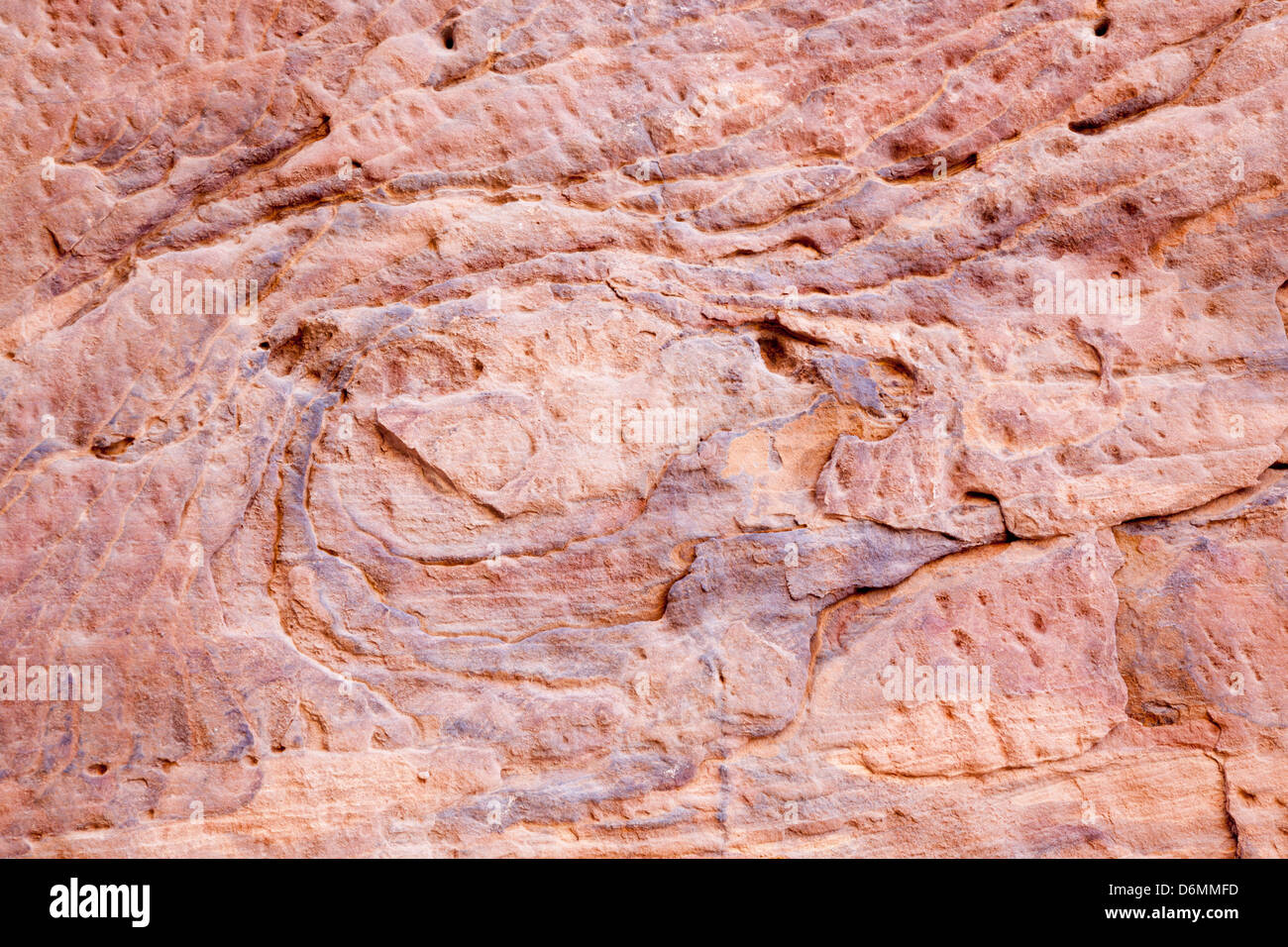 Astrazione naturale in pietra, da Petra, Giordania, una rosa texture di sfondo Foto Stock