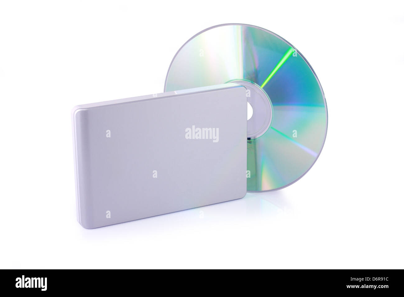 Disco rigido esterno e dvd isolati su sfondo bianco. Compreso il percorso di clipping. Foto Stock