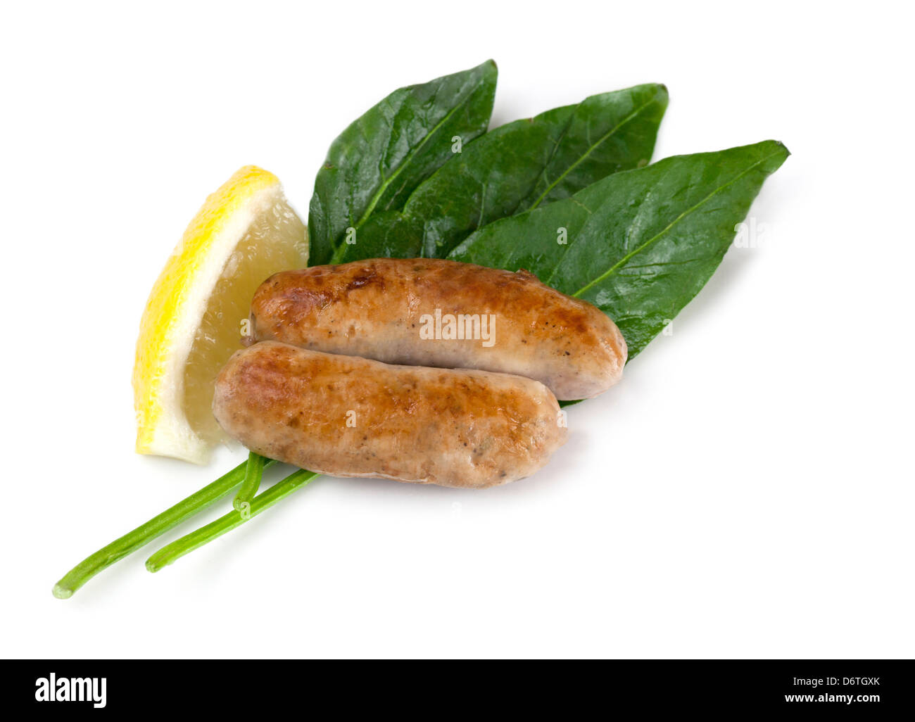 Inglese tradizionale con salsicce cucinate con basilico e limone. Foto Stock