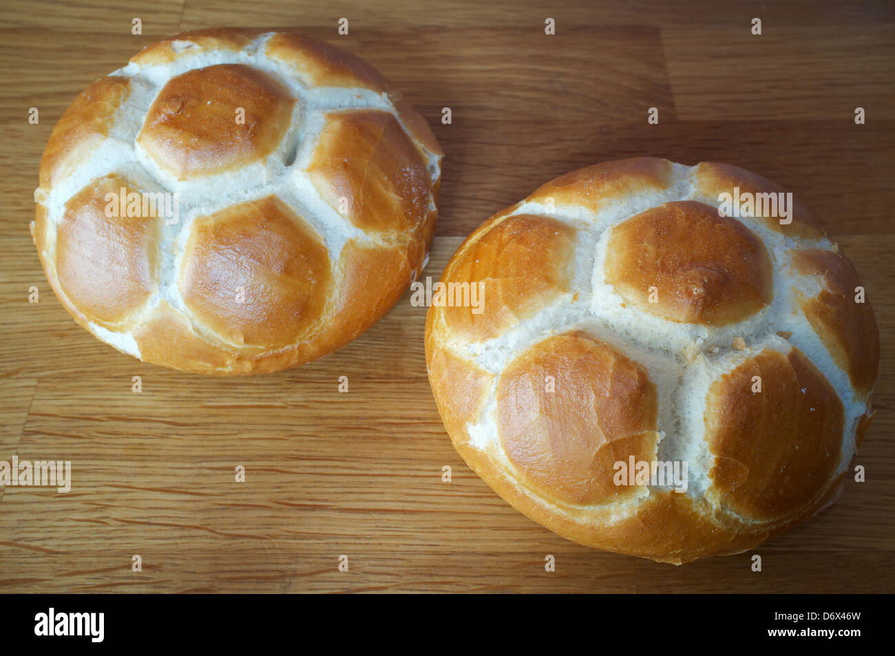 A forma di pallone da football panini Foto Stock