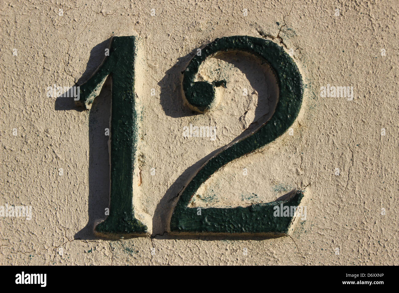 12 Tile numerati (numero di porta) Foto Stock