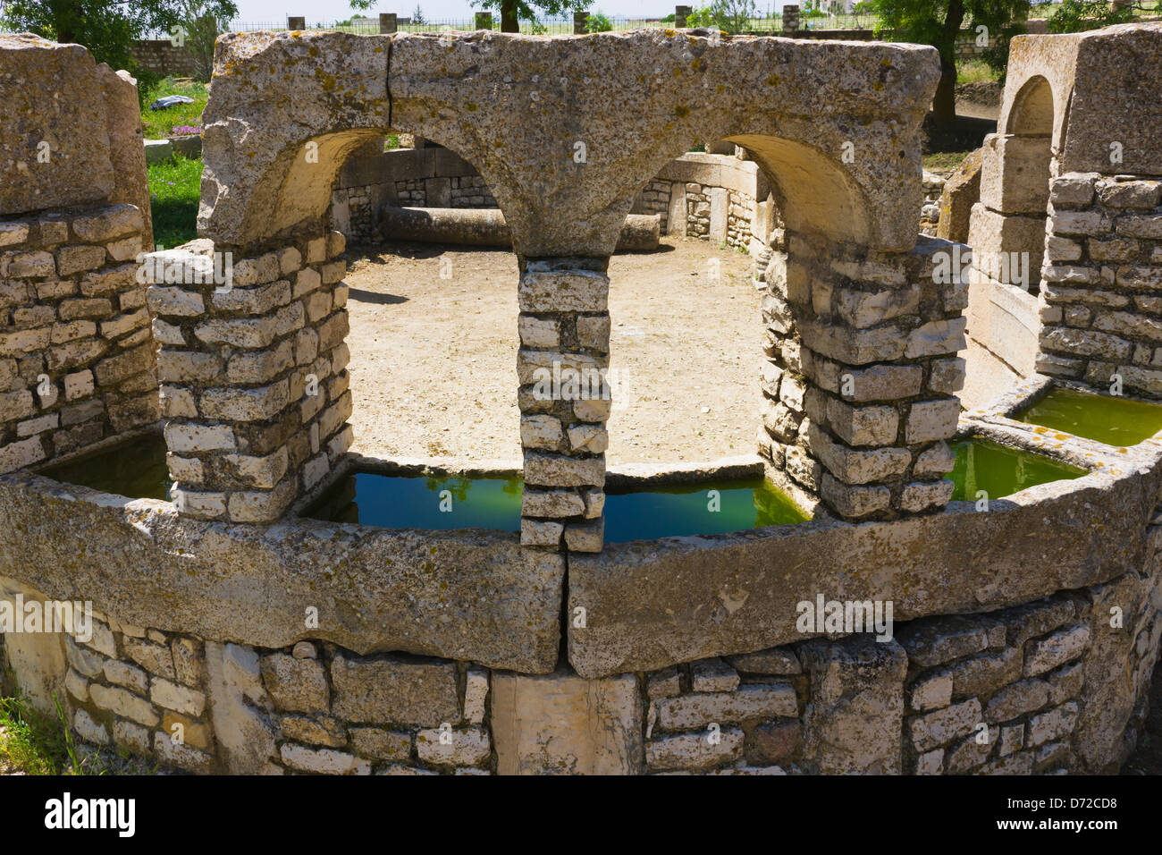 Contenitore per misurare per fini fiscali in epoca romana, rovine romane, Makthar, Tunisia Foto Stock