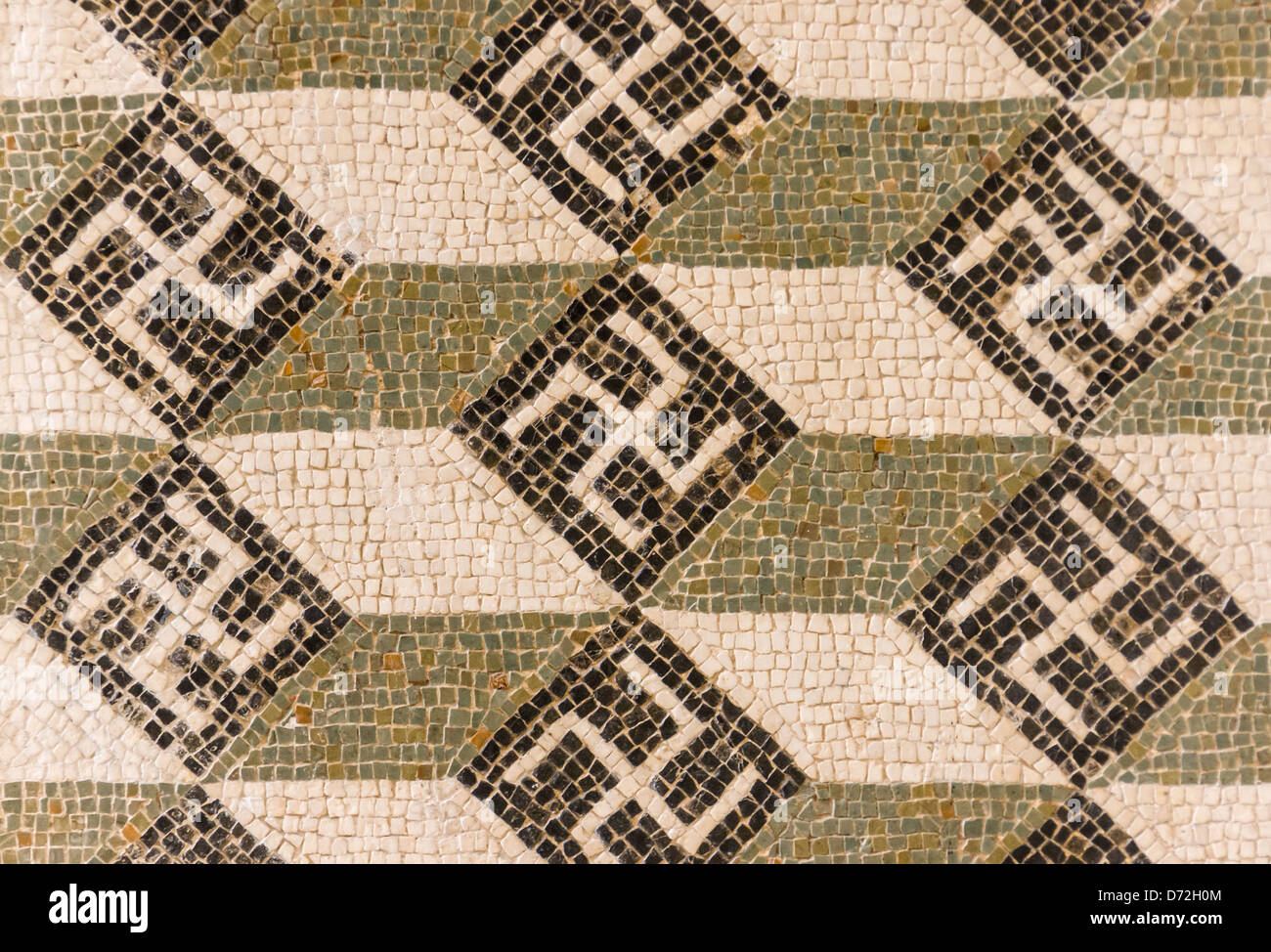 Mosaico (Swastika pattern) in El Djem Museum, Tunisia Foto Stock