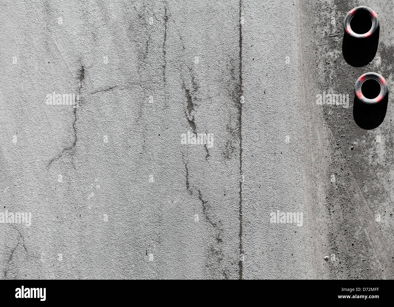 Texture di sfondo di un manto stradale in asfalto con pneumatici Foto Stock
