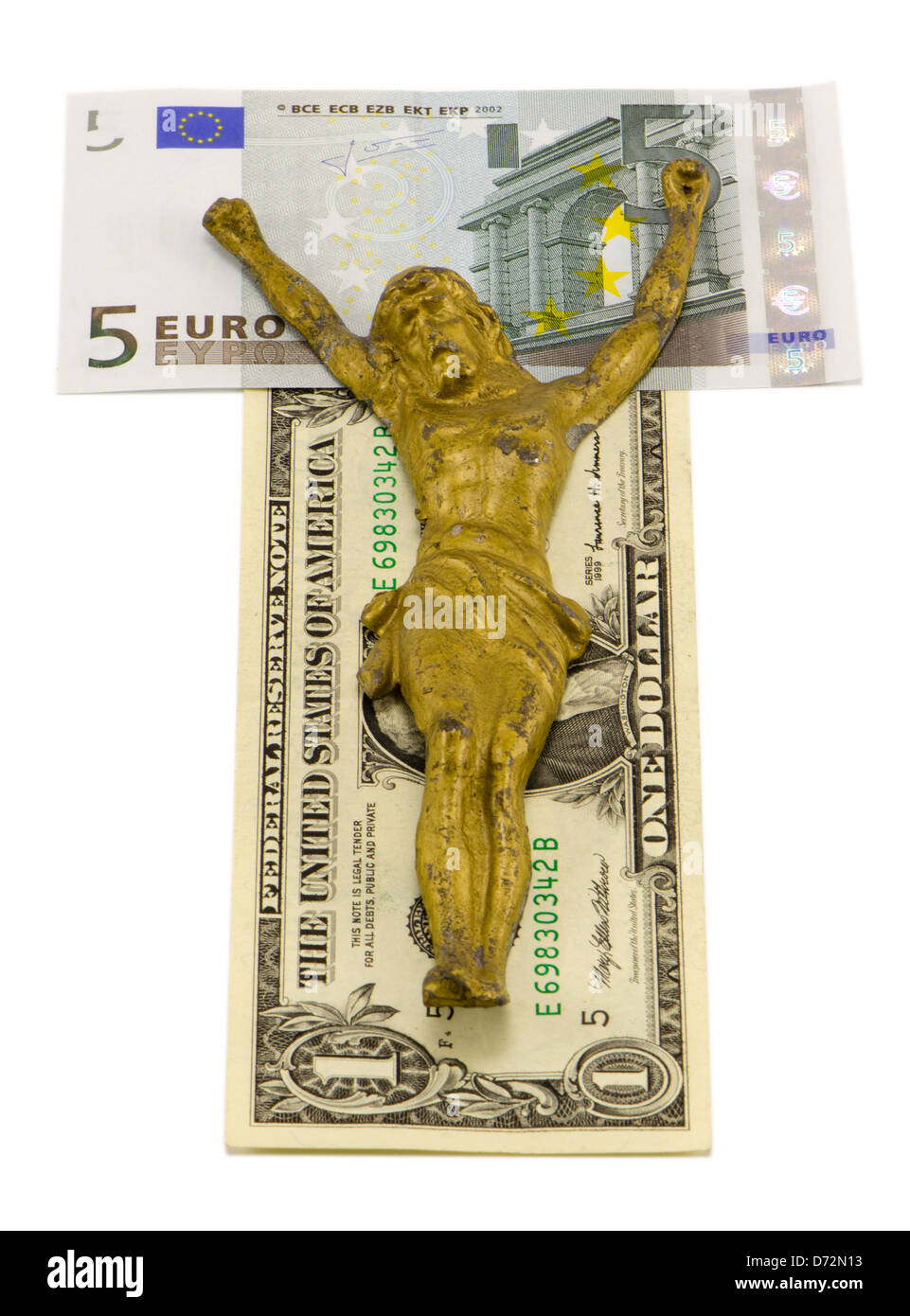 Oro Gesù crocifiggere su euro e dollaro banconote isolato sul concetto di bianco della finanza mondiale crisi dieci euro e dollaro bankno Foto Stock