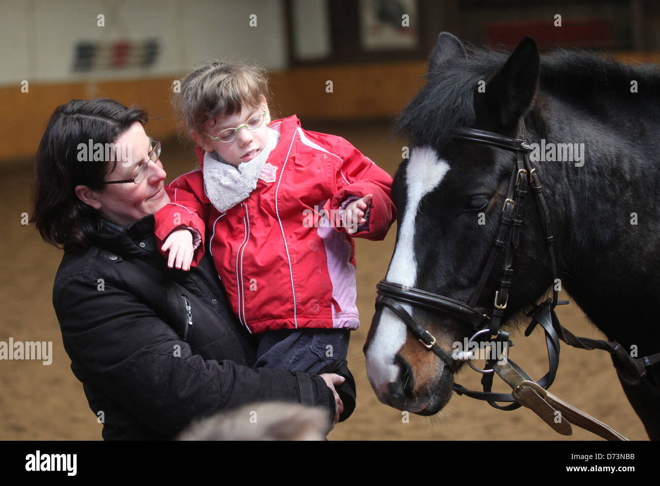 Hassmoor, Germania, ippoterapia con bambini disabili Foto Stock