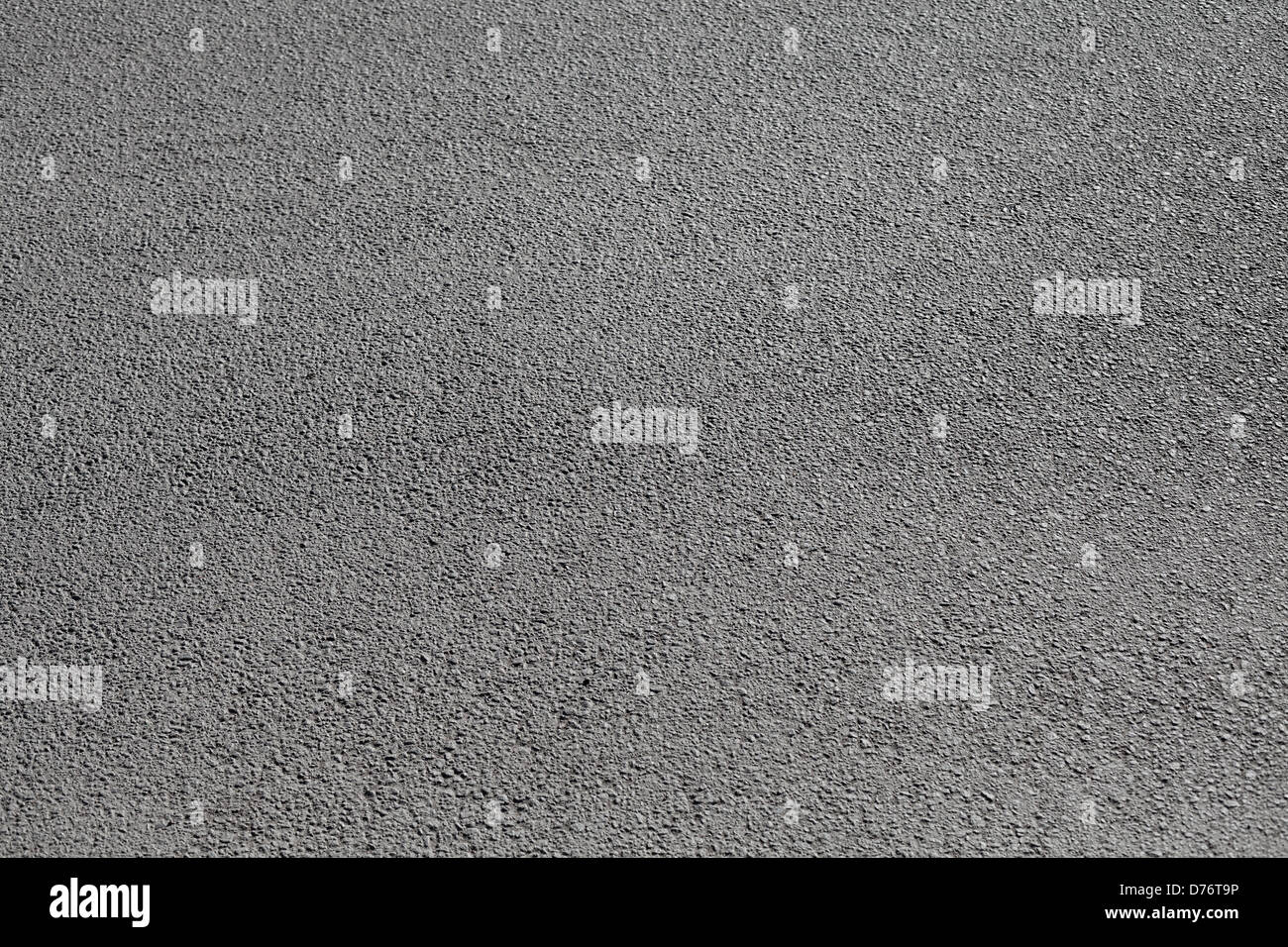 Grigio asfalto urbano sfondo su strada Foto Stock