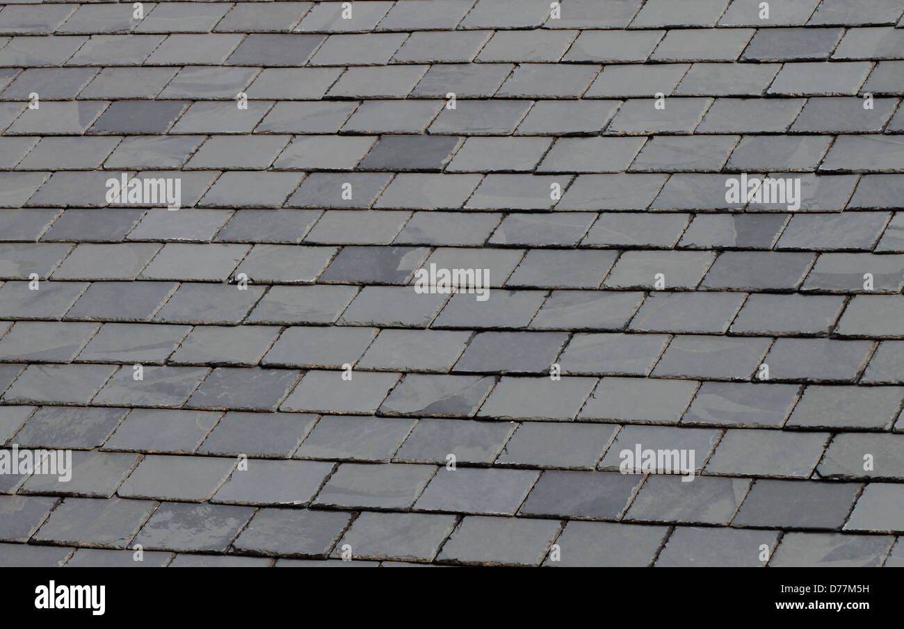Sfondo di colore grigio o gey in piastrelle di ardesia del tetto. Foto Stock