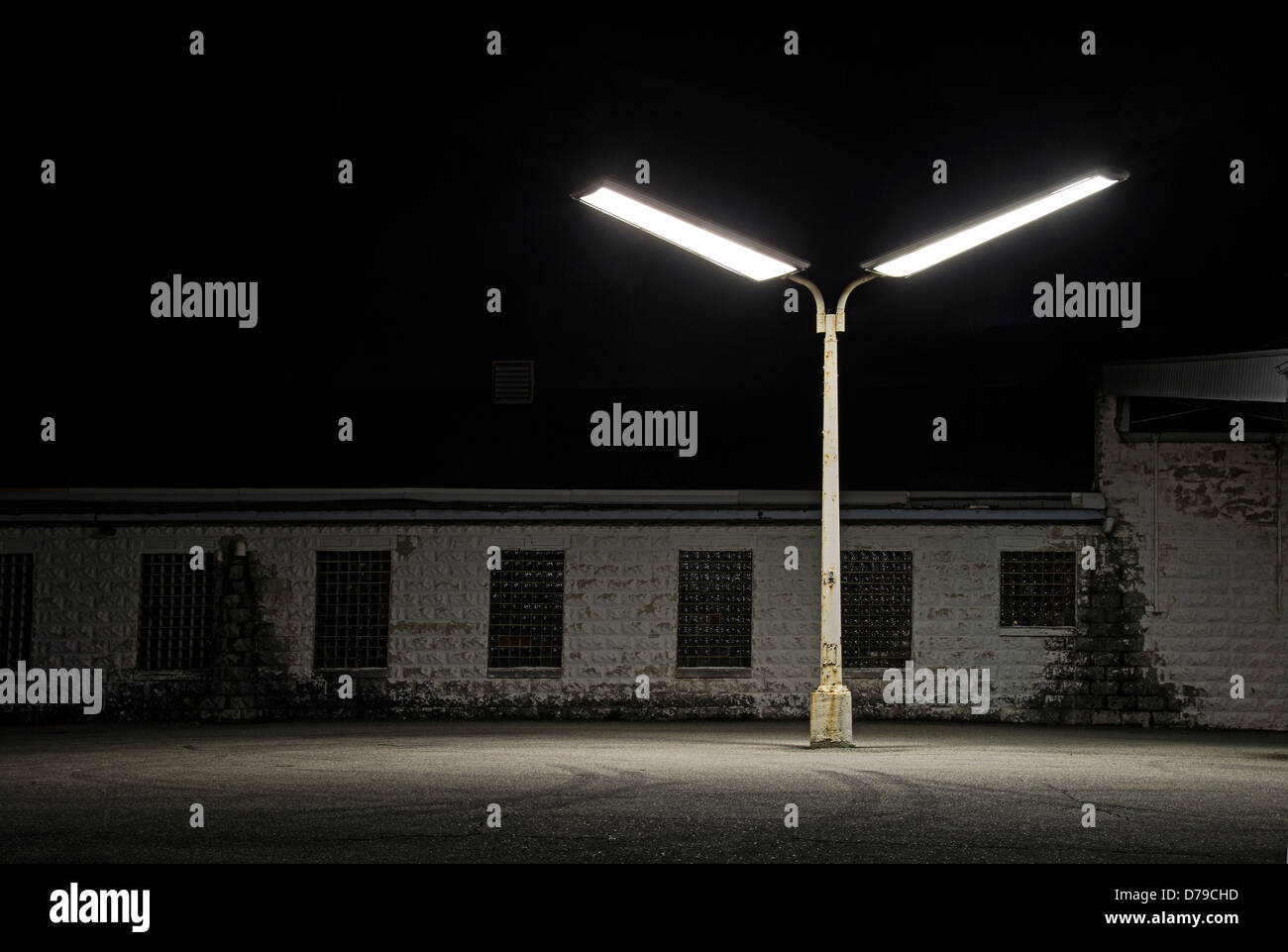 Fari vecchi & Building di notte Foto Stock