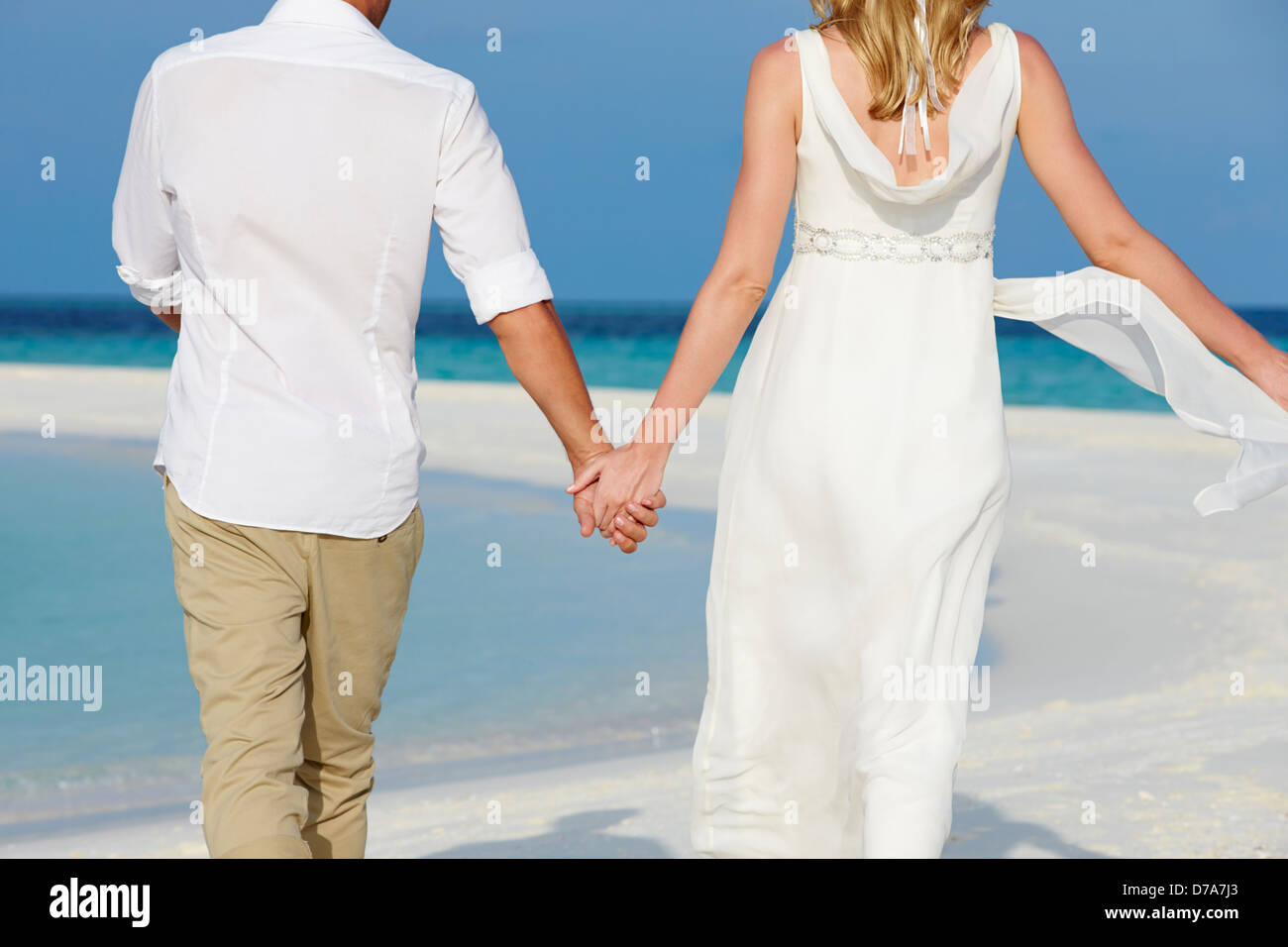 Matura in un bel matrimonio sulla spiaggia Foto Stock
