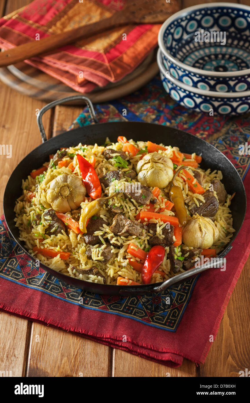 Plov agnello e riso pilaff Asia Centrale cibo Foto Stock