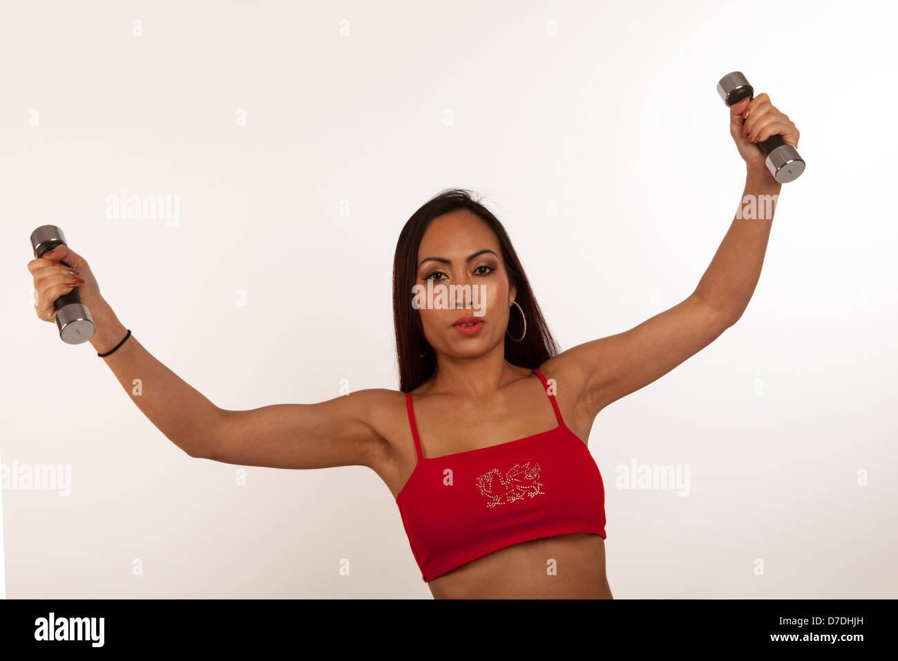 Allenamento con i pesi a mano come parte di una routine di fitness Foto Stock