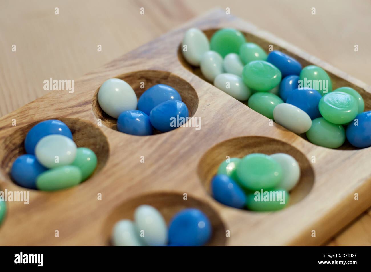 Mancala. Scheda tradizionale gioco. Foto Stock