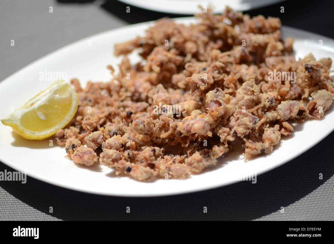 Fried 'Chopitos' con il limone Foto Stock