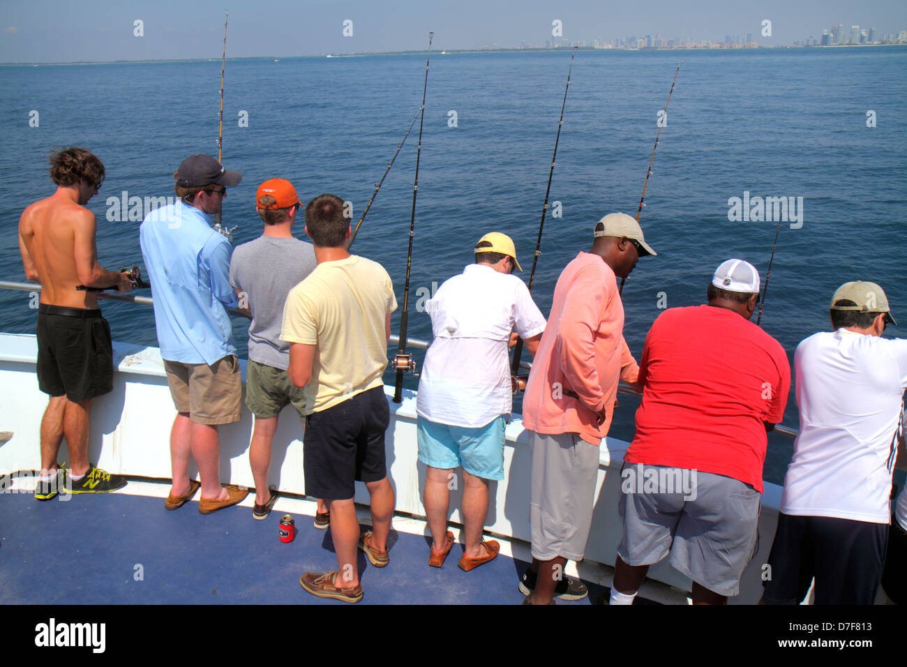 Miami Beach Florida,acqua dell'Oceano Atlantico,barca da pesca charter,a bordo,cabina passeggeri,Black Blacks African Africans etnic minority,man men mal Foto Stock