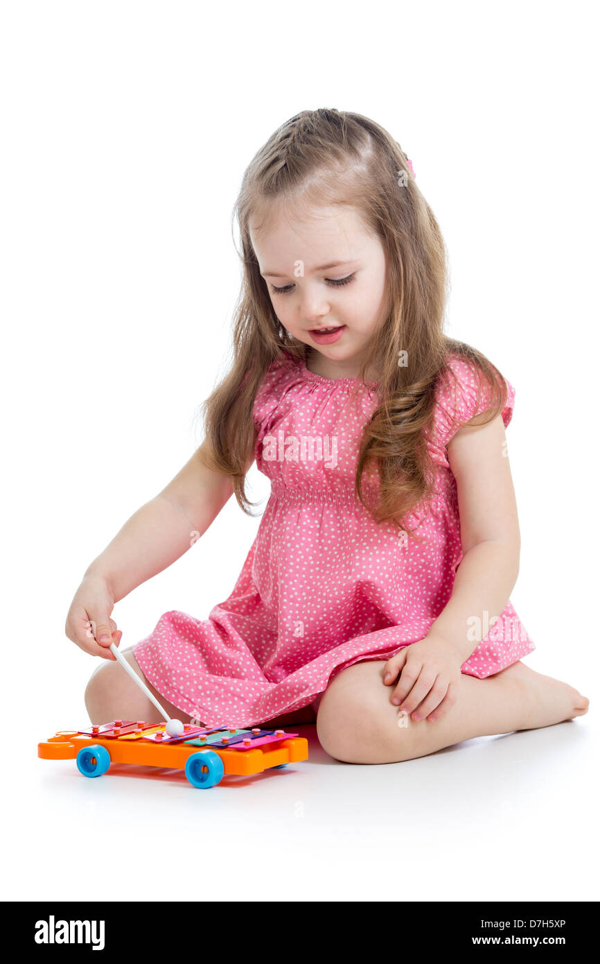 Kid girl riproduzione giocattolo musicale Foto Stock