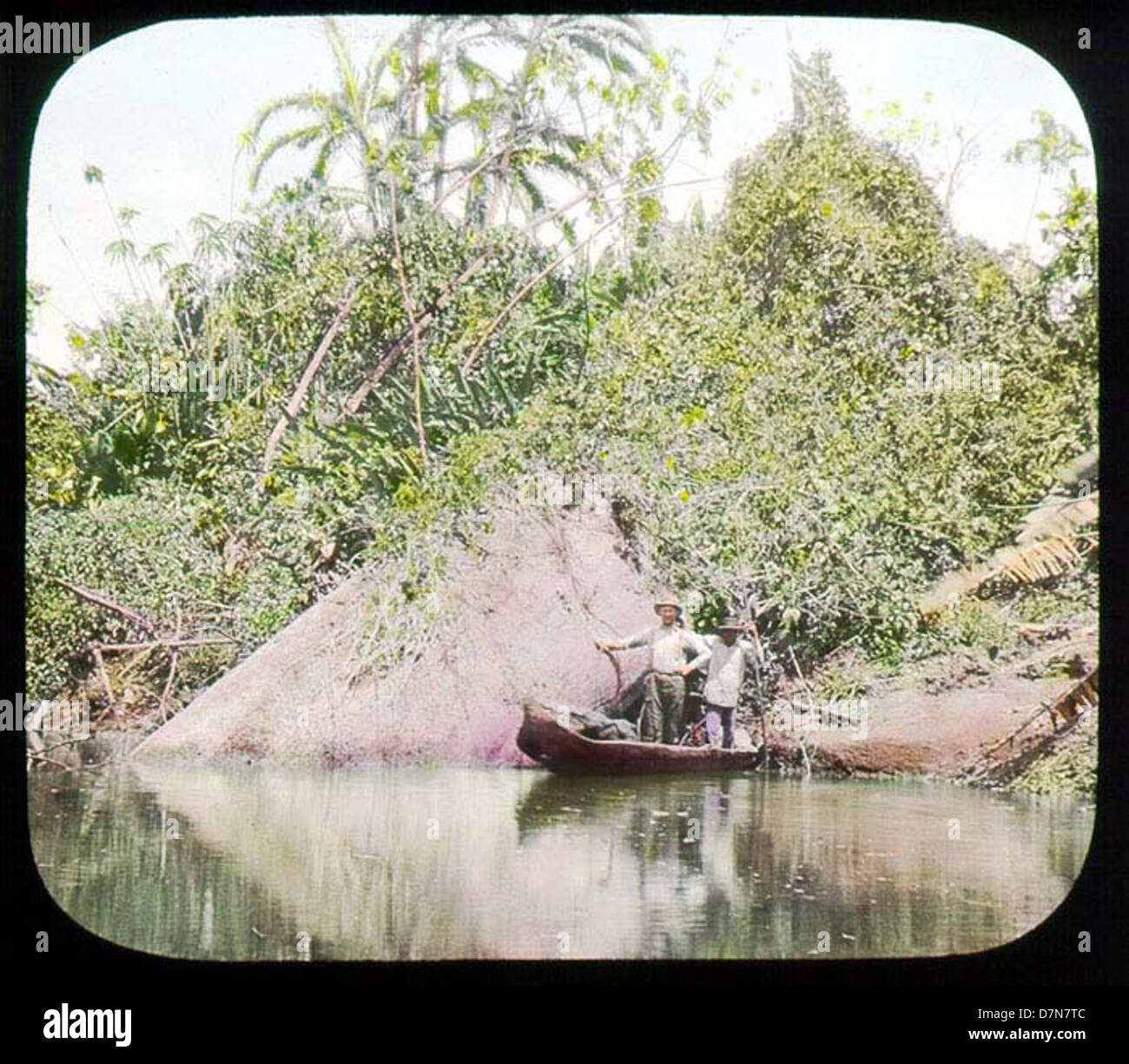 Gli uomini in barca sul fiume Foto Stock