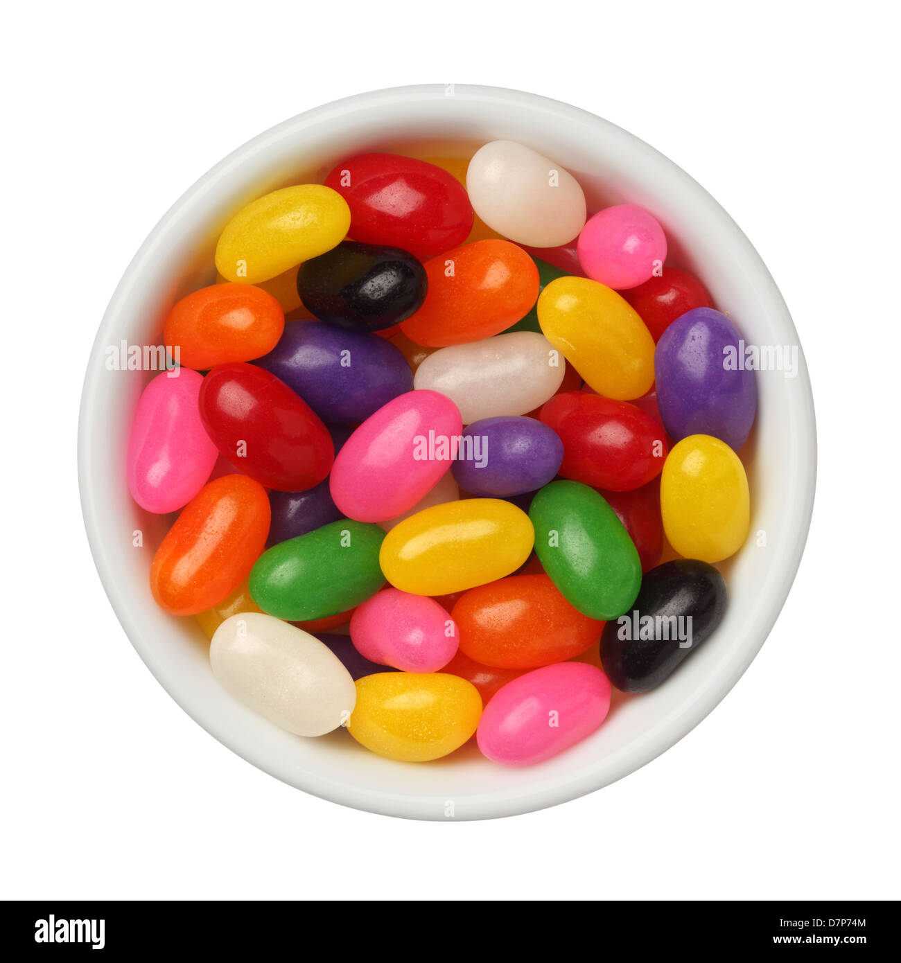 Jellybeans in un recipiente isolato su sfondo bianco, close up Foto Stock
