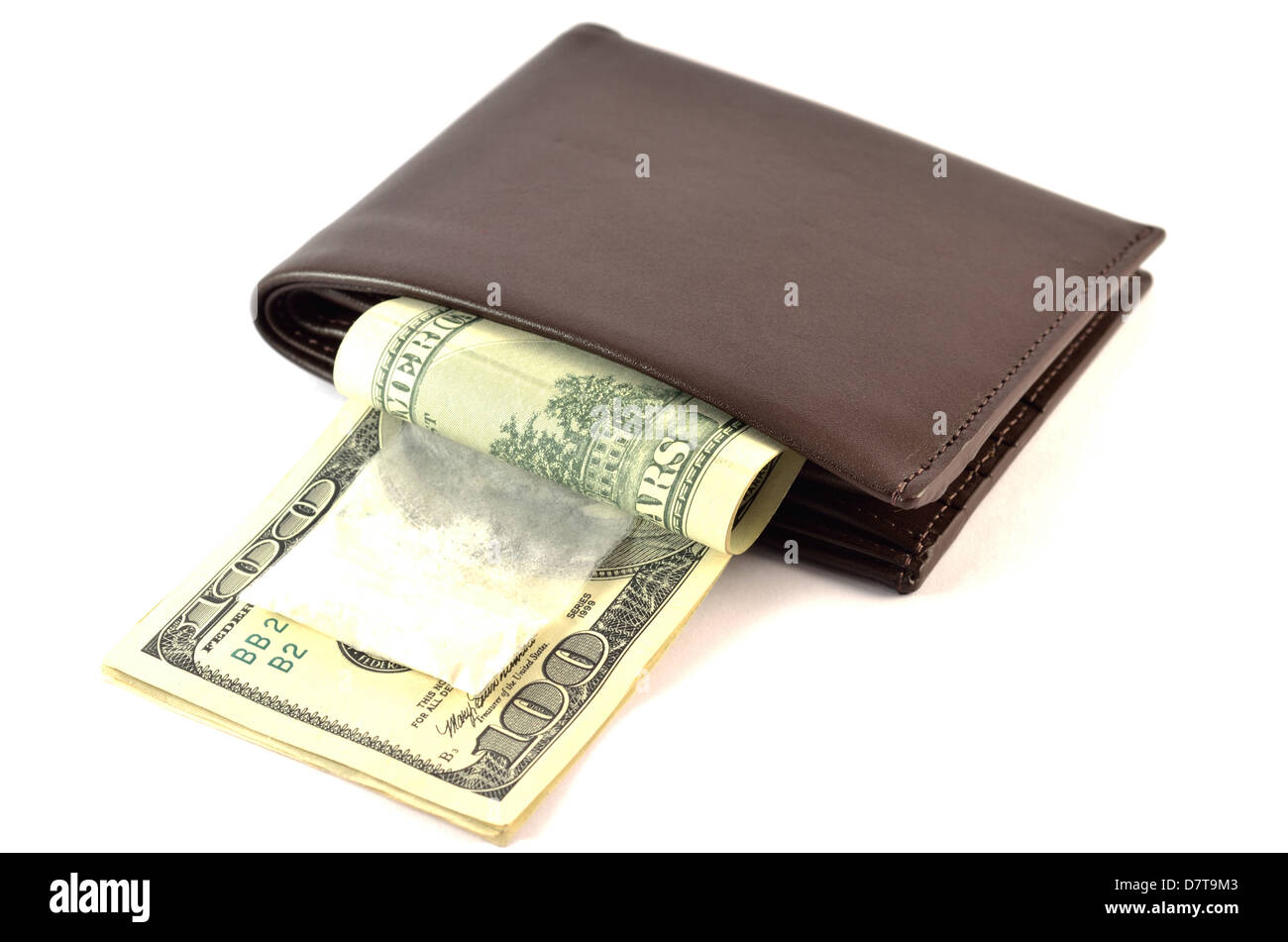 Polvere bianca sul denaro appendere fuori della borsa Foto Stock