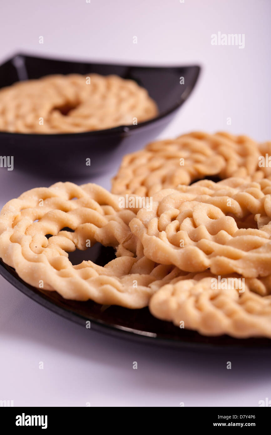 Murukku è uno snack salato popolare in India del Sud. Foto Stock