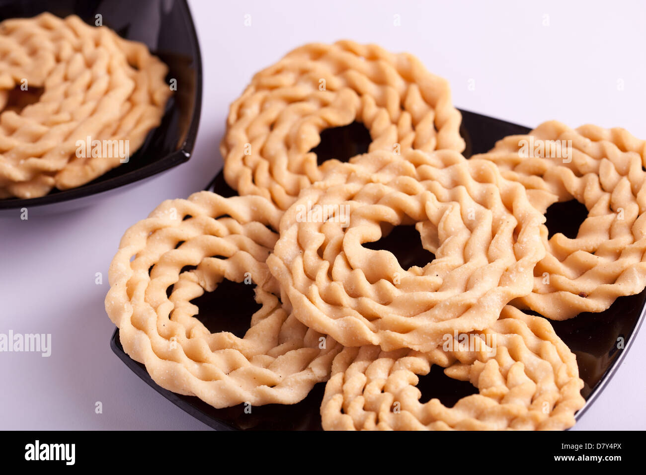 Murukku è uno snack salato popolare in India del Sud. Foto Stock