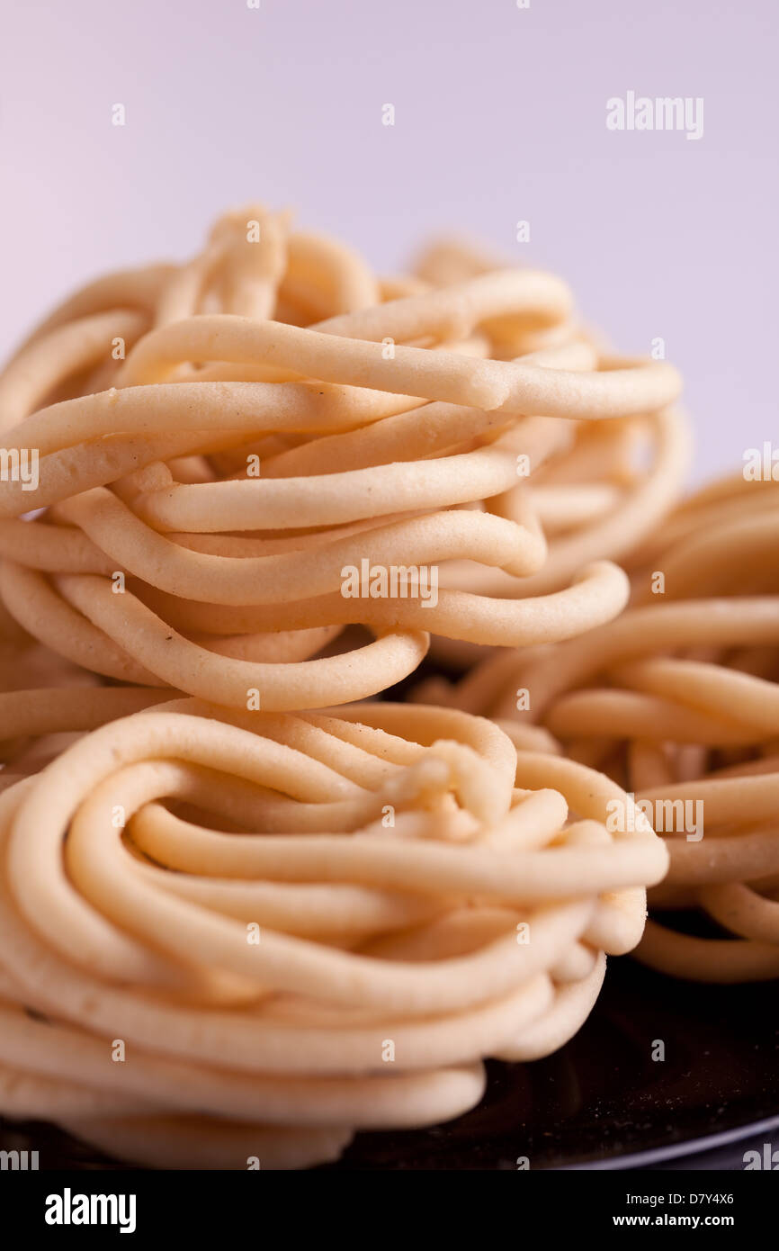 Murukku è uno snack salato popolare in India del Sud. Foto Stock