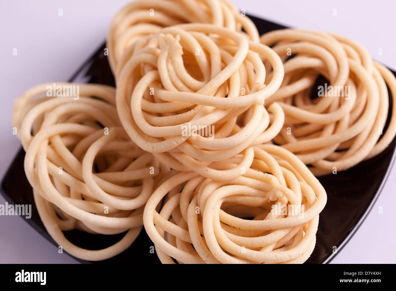 Murukku è uno snack salato popolare in India del Sud. Foto Stock