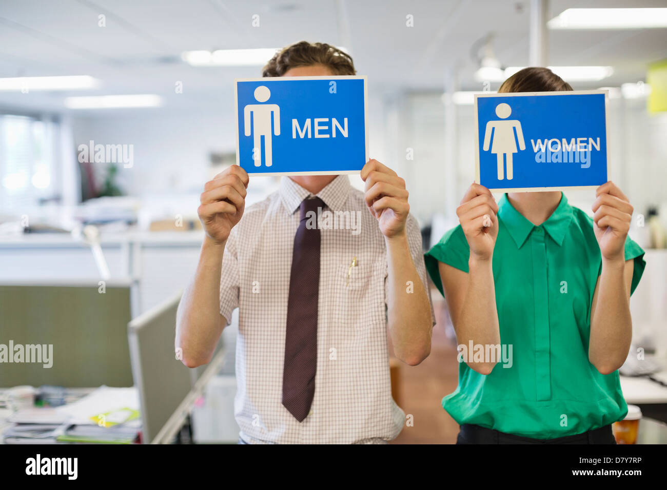La gente di affari azienda 'men " e " donne " segni Foto Stock