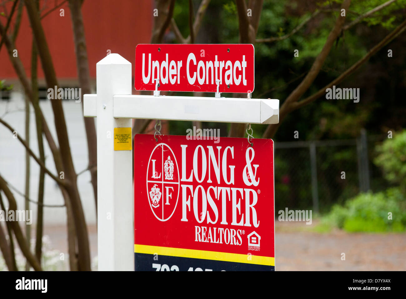 Lunga e Foster realty sotto contratto firmare Foto Stock