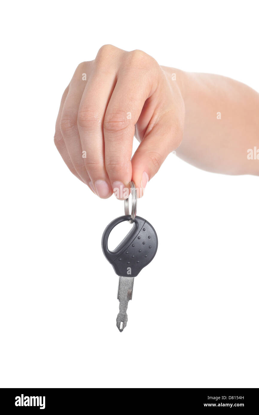Donna mano dando una chiave auto isolato su uno sfondo bianco Foto Stock