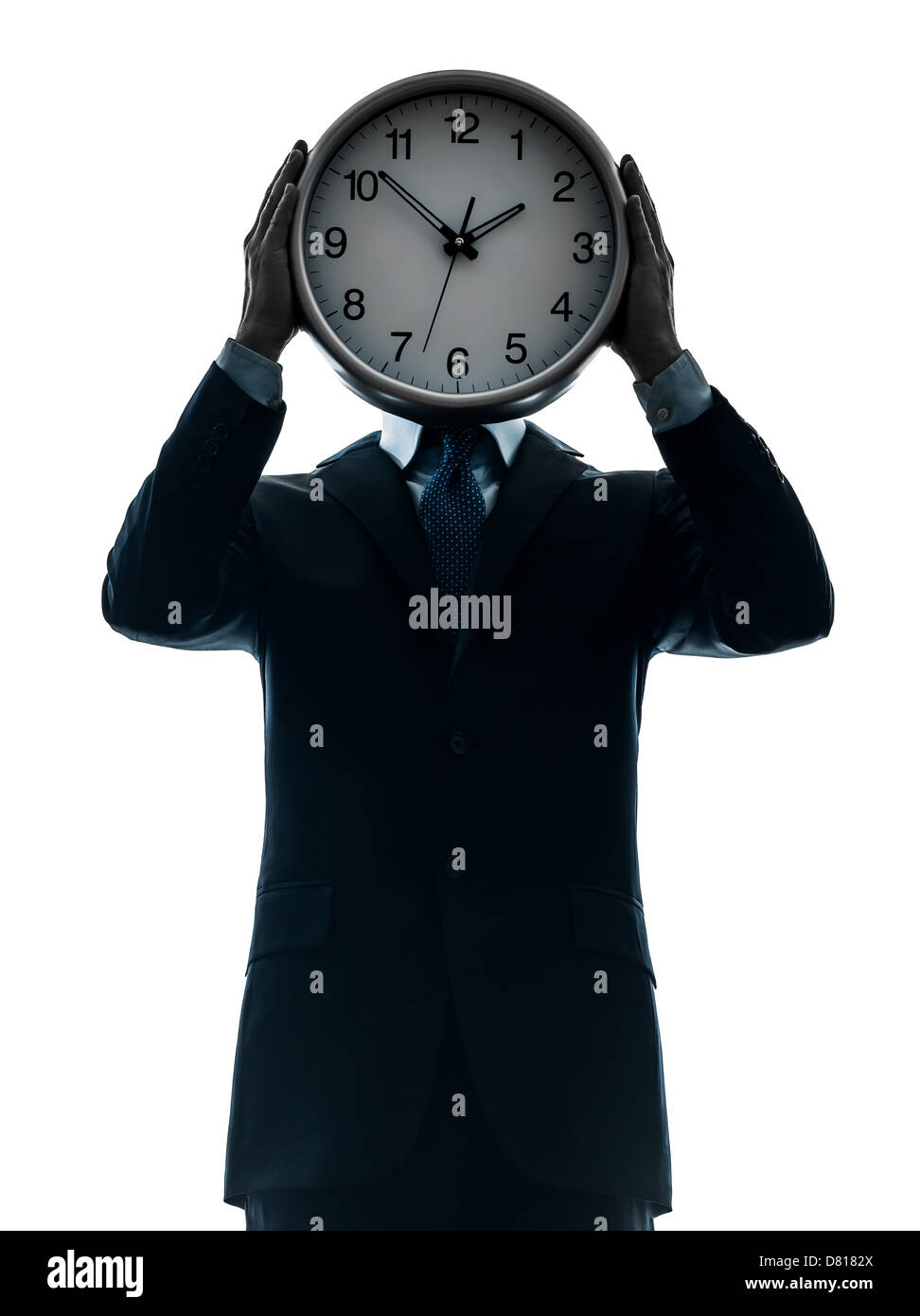 Un imprenditore tenendo premuto clock in silhouette studio isolato su sfondo bianco Foto Stock