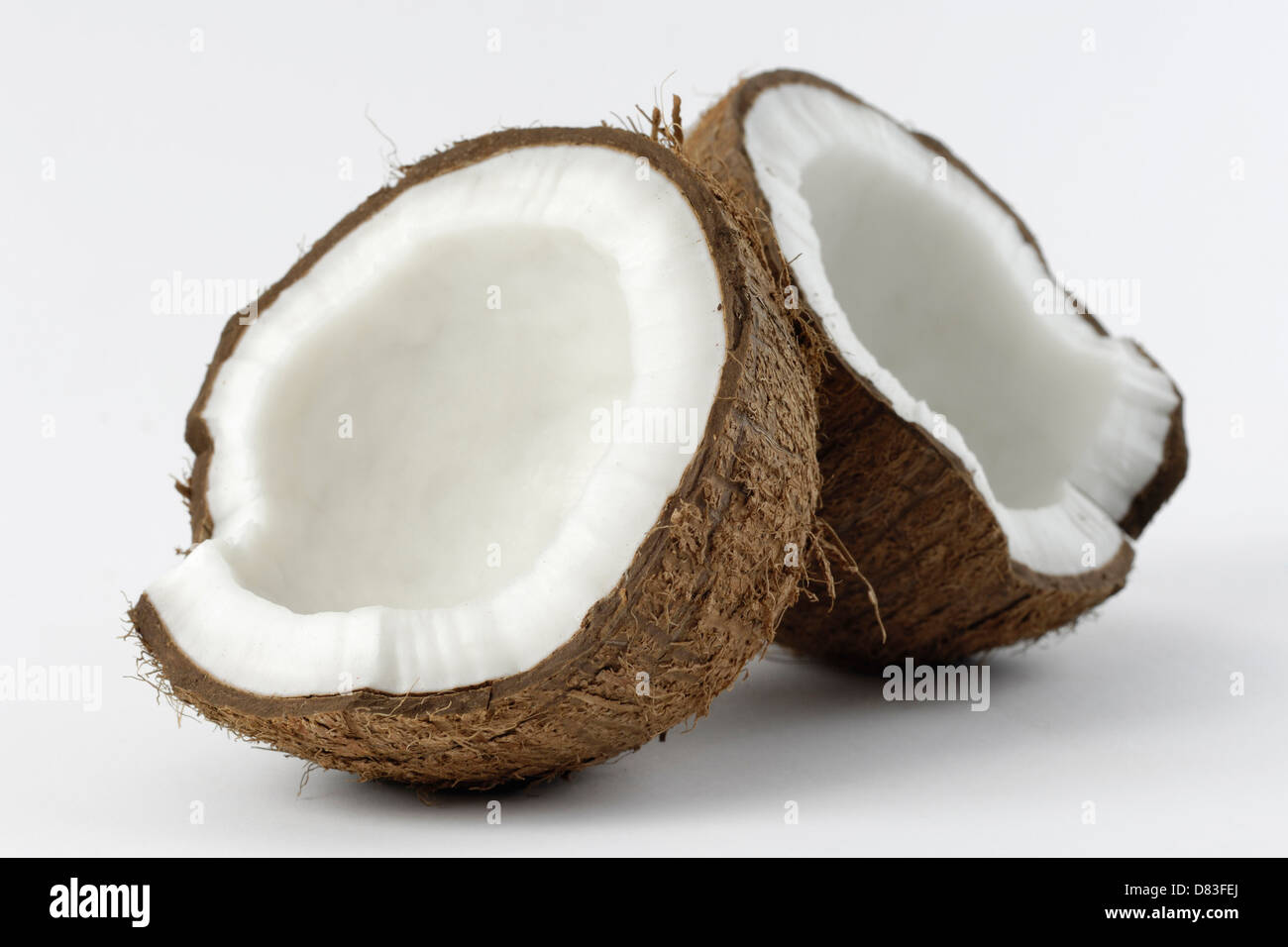 Il Cocco spaccata in due metà Foto Stock