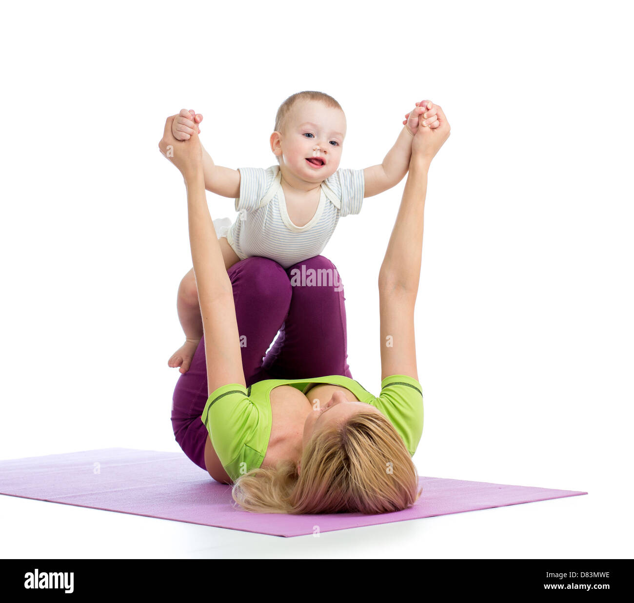 Madre con bambino facendo ginnastica ed esercizi per il fitness Foto Stock