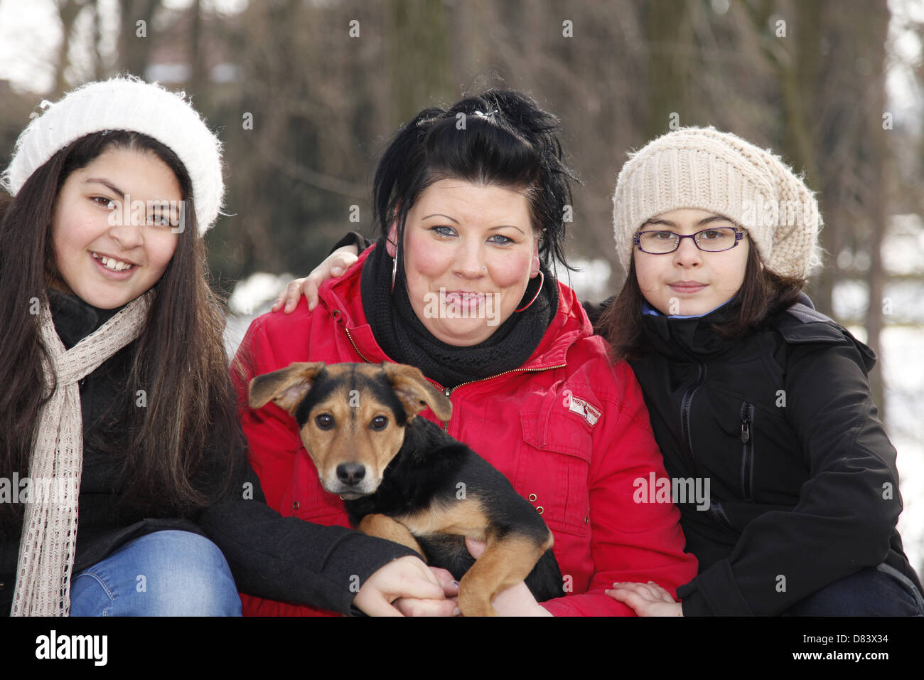 famiglia con il cane Foto Stock