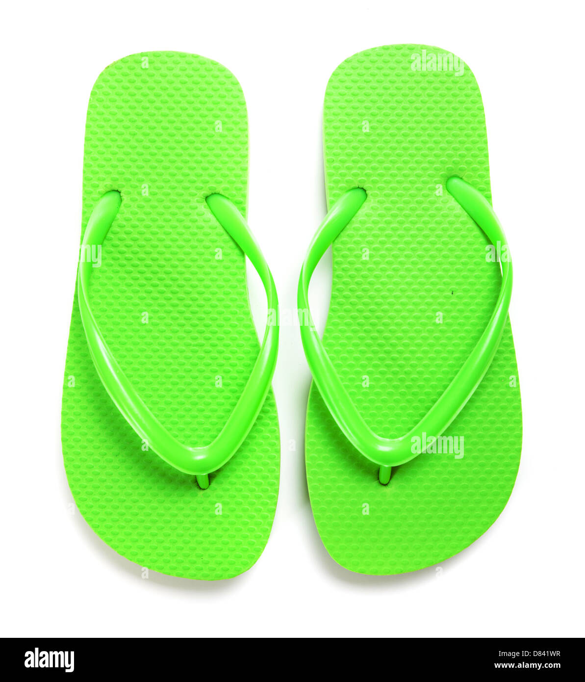 Una coppia di verde lime flipflops su sfondo bianco Foto Stock