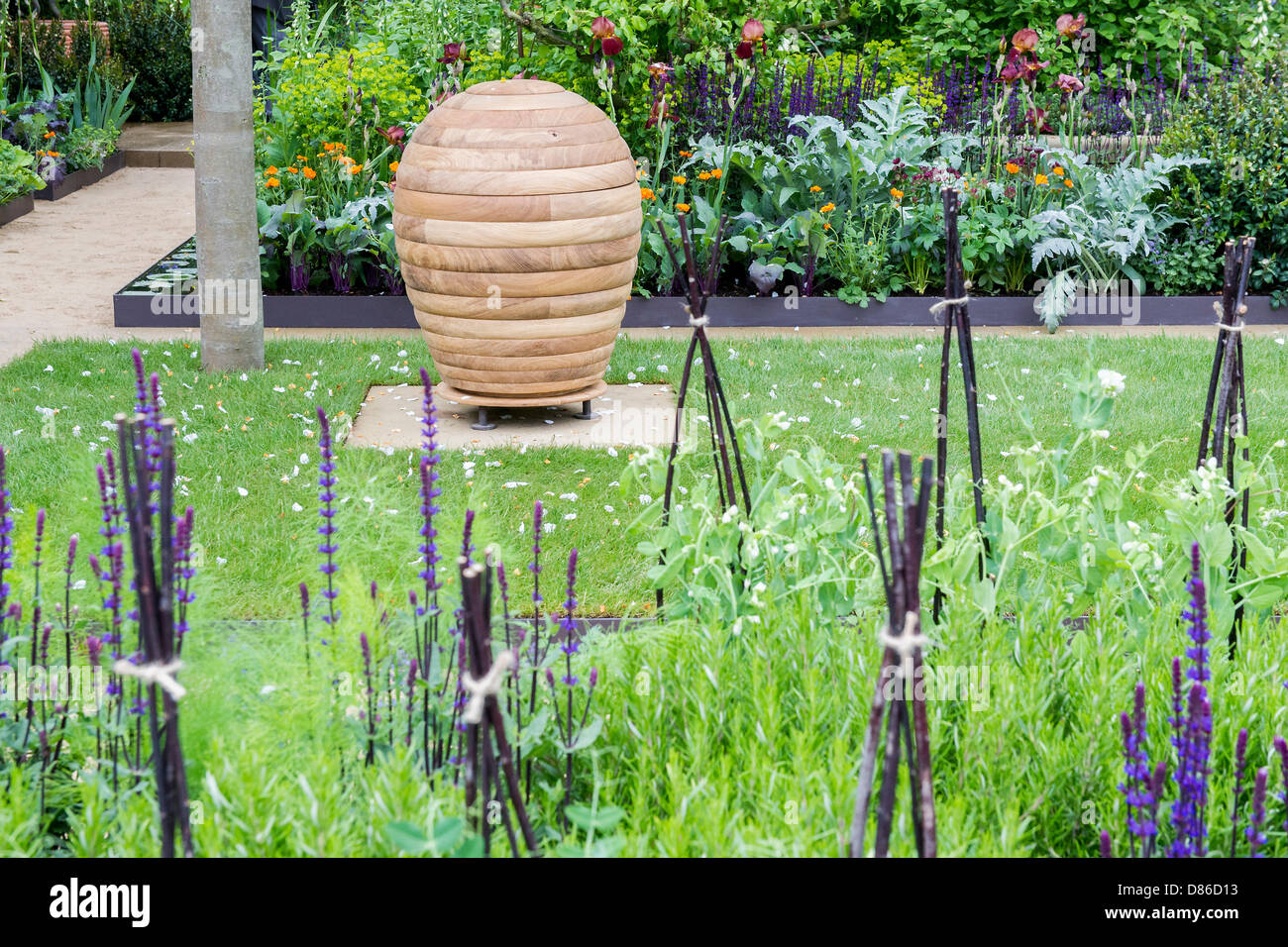 Londra, Regno Unito. 20 Maggio 2013.Il giardino Homebase - "A causa i semi del cambiamento". Il primo giorno del Chelsea Flower Show. Il Royal Hospital Chelsea. Credito: Guy Bell/Alamy Live News Foto Stock