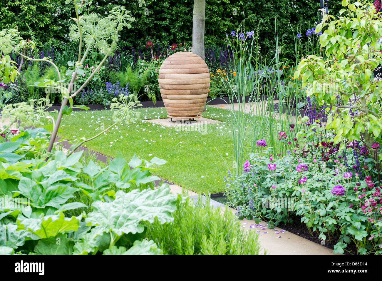 Londra, Regno Unito. 20 Maggio 2013.Il giardino Homebase - "A causa i semi del cambiamento". Il primo giorno del Chelsea Flower Show. Il Royal Hospital Chelsea. Credito: Guy Bell/Alamy Live News Foto Stock