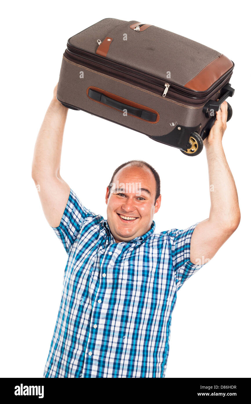 Ridendo uomo passeggero solleva il suo bagaglio, isolati su sfondo bianco Foto Stock