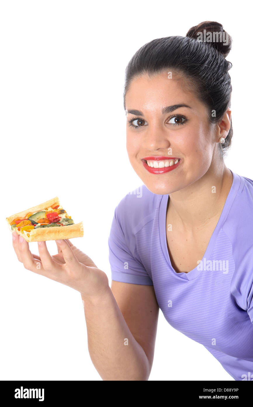 Giovane donna di mangiare verdura Creme Fraiche Tart isolata contro uno sfondo bianco con un tracciato di ritaglio Foto Stock