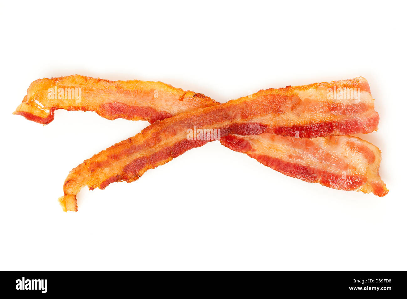 Cuocere la pancetta unte contro una massa posteriore Foto Stock