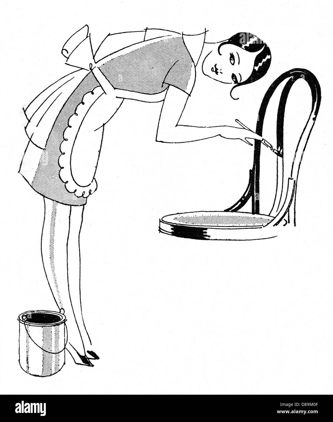 DONNA CHE DIPINGE UNA SEDIA Foto Stock