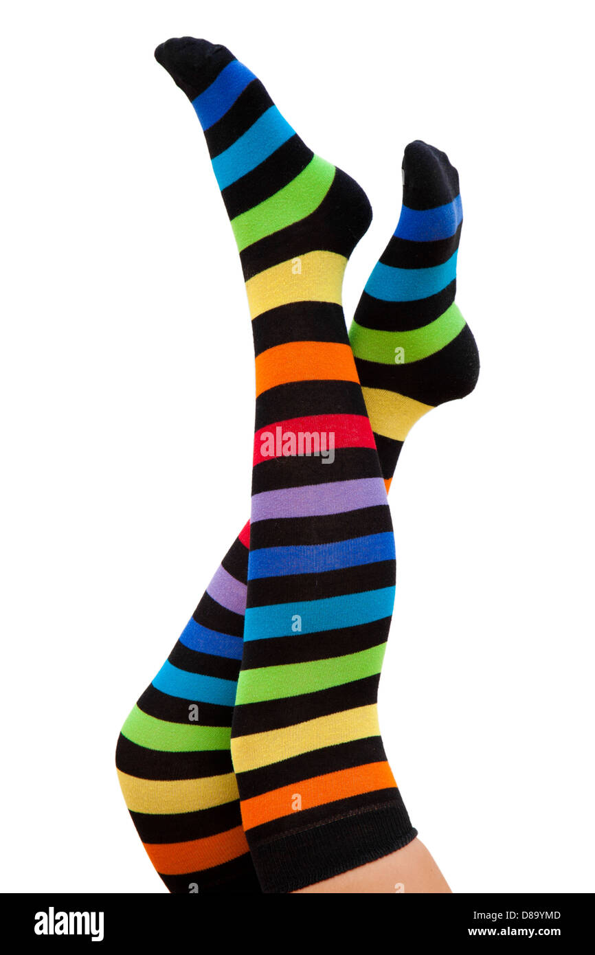 Femmina di gambe in calze a strisce Foto Stock Femmina di gambe in calze a strisce Foto Stock