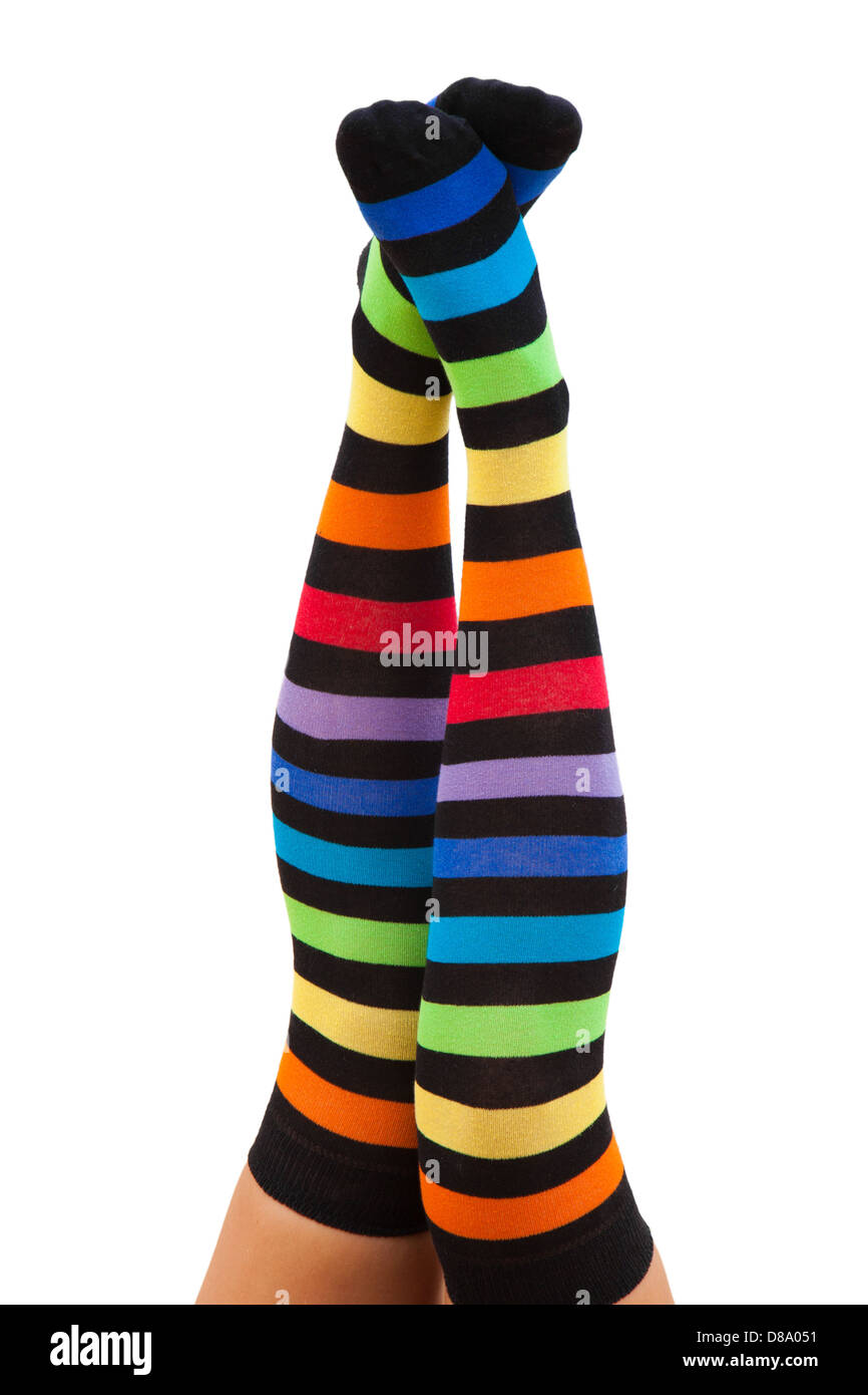 Femmina di gambe in calze a strisce Foto Stock Femmina di gambe in calze a strisce Foto Stock