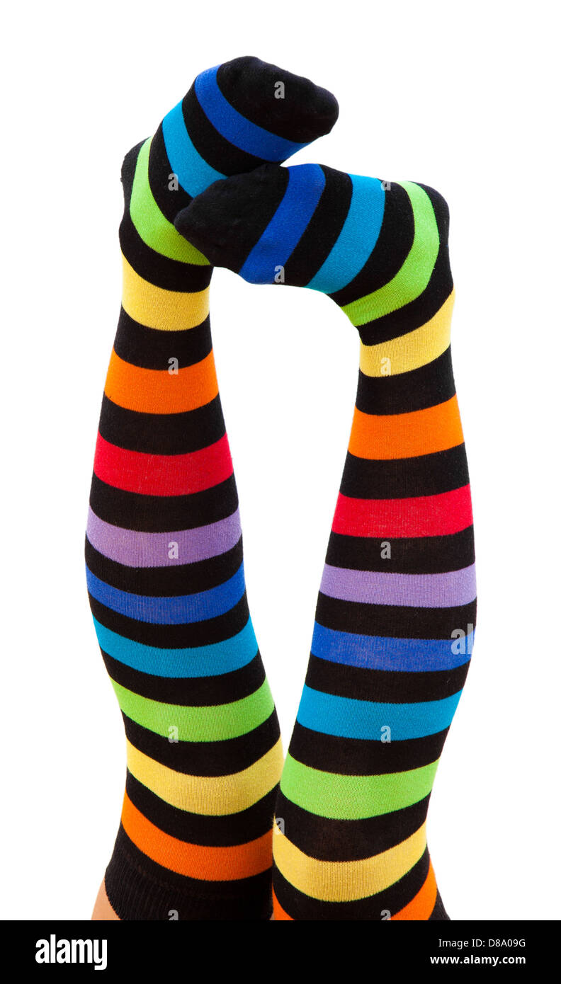 Femmina di gambe in calze a strisce Foto Stock Femmina di gambe in calze a strisce Foto Stock