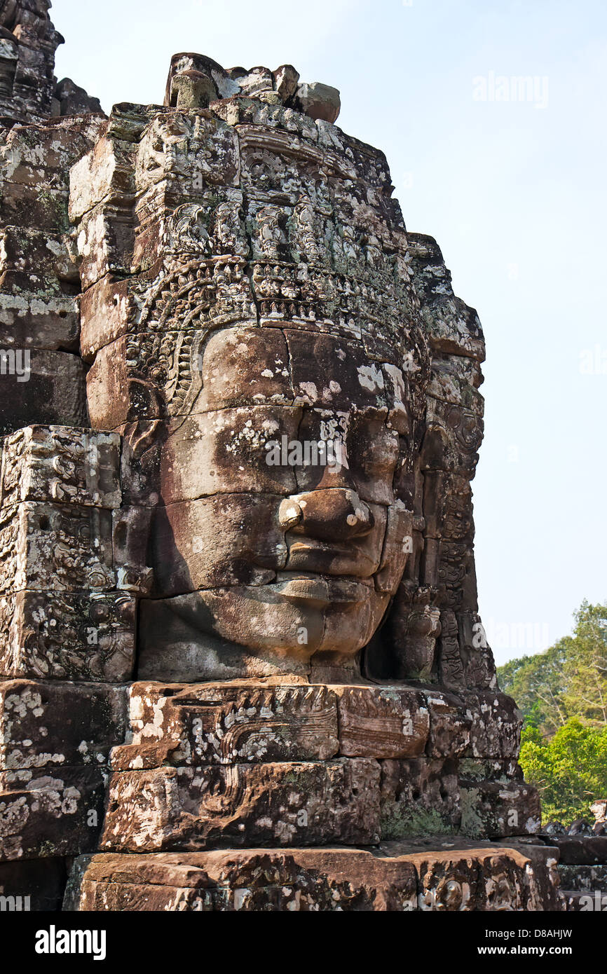 Antico volto scolpito in Angkor Wat, Cambogia Foto Stock