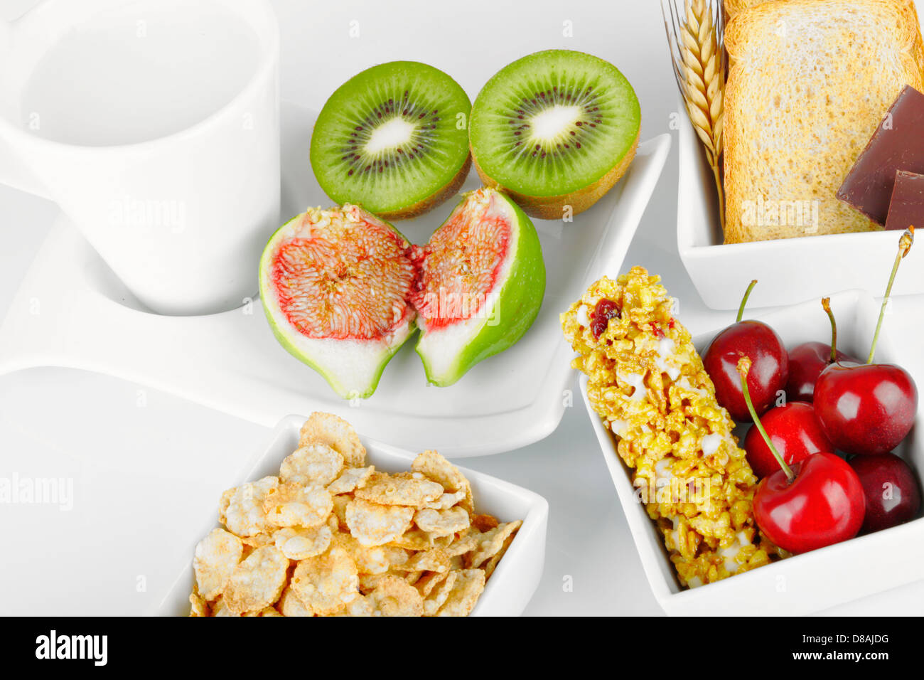 La prima colazione con frutta e barra di energia Foto Stock